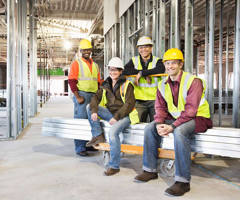 Group of 4 construction workers